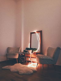 Chairs and table against wall at home