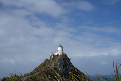 The iconic and historical nugget point light house in new zealand.