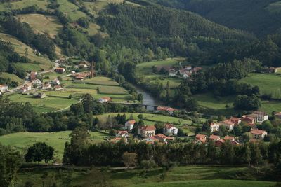 High angle view of houses on field