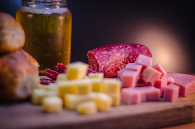 Close-up of food on cutting board at table