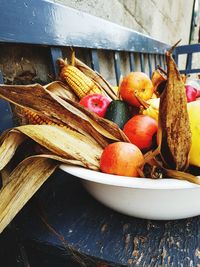 High angle view of fruits in basket on table