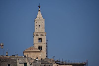 Low angle view of church against clear blue sky