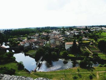 Aerial view of cityscape against sky