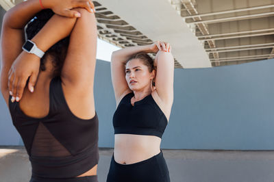 Young woman exercising at gym