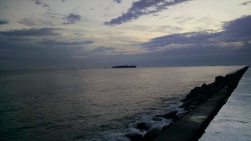 Scenic view of sea against sky during sunset