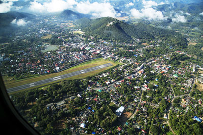 Aerial view of town against sky