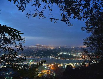 Illuminated cityscape at night