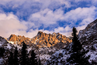 Snowcapped mountains against sky