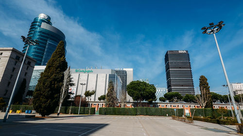 Modern buildings in city against sky