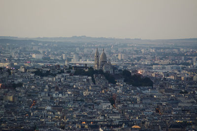 Aerial view of cityscape against clear sky