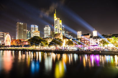 Illuminated buildings in city at night