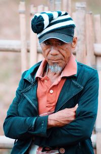 Portrait of man wearing hat