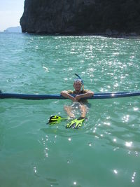 Man in boat on sea