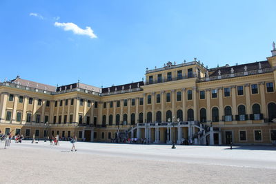 Facade of historic building against blue sky