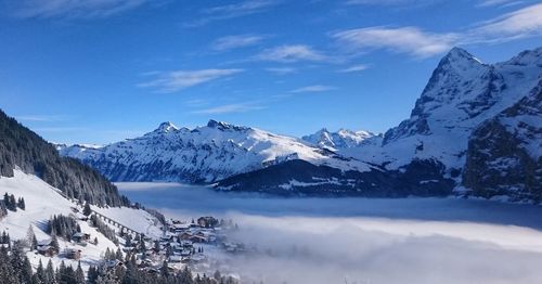 Scenic view of snow covered mountains