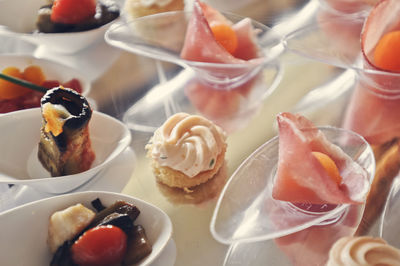 High angle view of desserts served on table