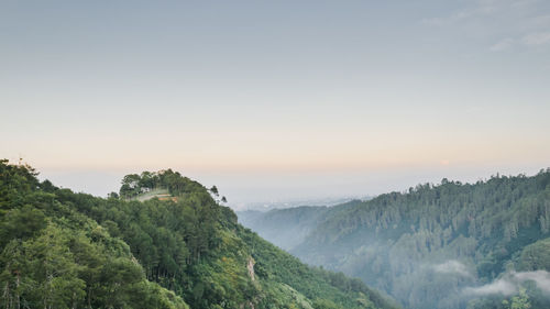 Scenic view of mountains against sky during sunset
