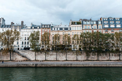 Seine river against buildings in city