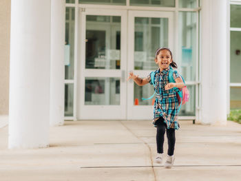 Diverse mixed race pre school  going back to school after summer break