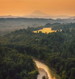 Scenic view of landscape against sky during sunset