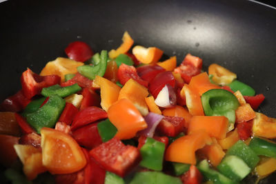 Close-up of chopped vegetables in cooking pan