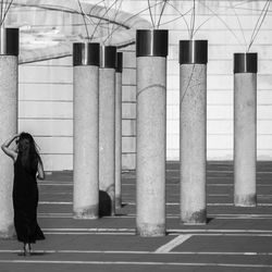 Woman standing in front of building