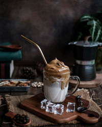 Close-up of dalgona coffee on table