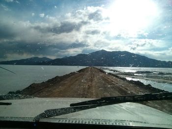 Scenic view of sea against cloudy sky