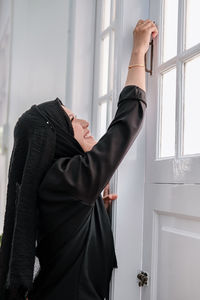 Cropped hand of man holding hands