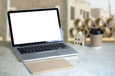 Close-up of laptop on table