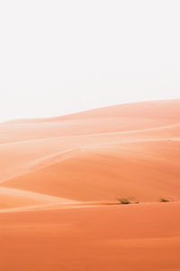 Scenic view of desert against clear sky