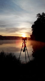 Scenic view of landscape at sunset