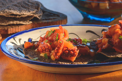 Close-up of meal served in plate on table