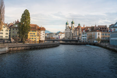 River amidst buildings in city