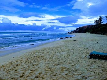 Scenic view of beach against sky