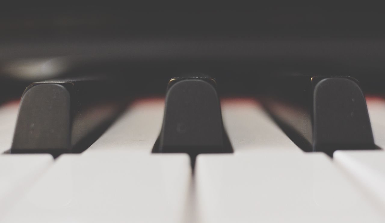 indoors, selective focus, close-up, in a row, piano key, still life, piano, focus on foreground, music, repetition, technology, arts culture and entertainment, no people, part of, shadow, detail, connection, pattern, musical instrument, backgrounds