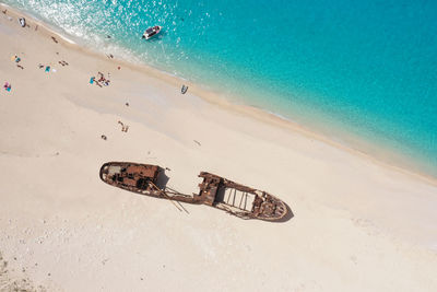 High angle view of text on beach