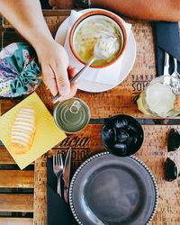 High angle view of person preparing food on table