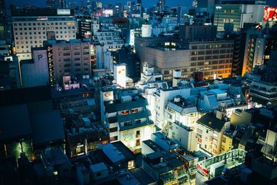 High angle view of illuminated cityscape at night