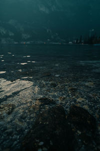 Close-up of rocks by sea