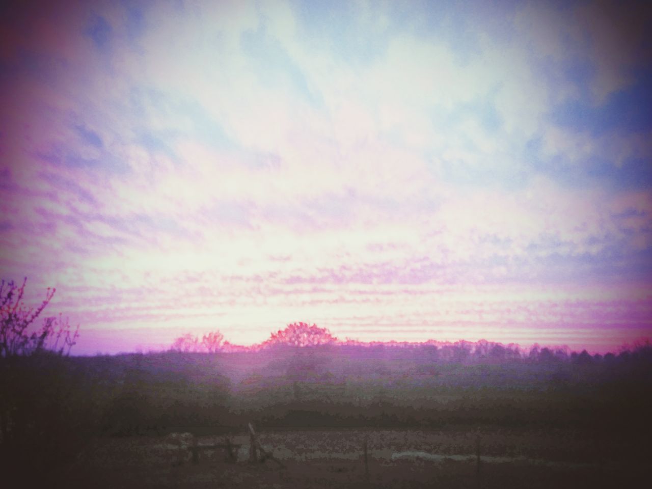 SCENIC VIEW OF LANDSCAPE AGAINST SKY AT SUNSET