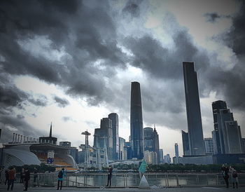 View of city against cloudy sky