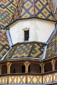 Low angle view of multi colored building roof