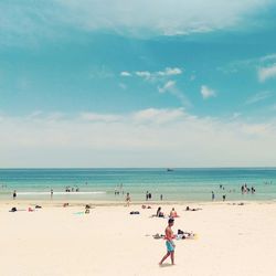 People enjoying at beach