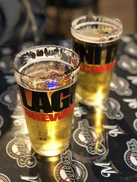 Close-up of beer glass on table