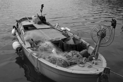 High angle view of fishing boat moored in lake