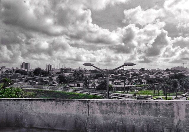 architecture, built structure, building exterior, sky, cloud - sky, city, cloudy, cityscape, river, bridge - man made structure, cloud, connection, water, tree, day, overcast, bridge, residential building, travel destinations, residential district