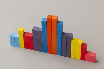Close-up of multi colored toy blocks against white background
