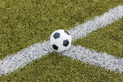 High angle view of soccer ball on field