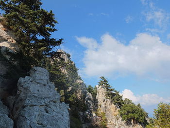 Low angle view of rocks against sky